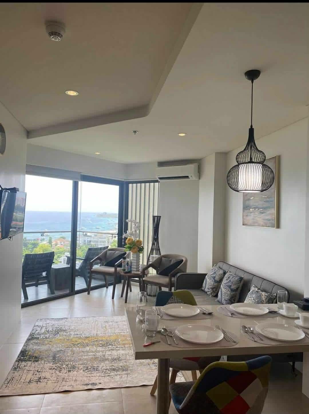 Living room with a sea view — a real unit from our current list