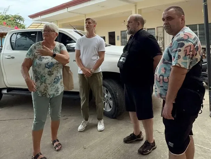 Valery and three clients outside a building in Cebu after a viewing