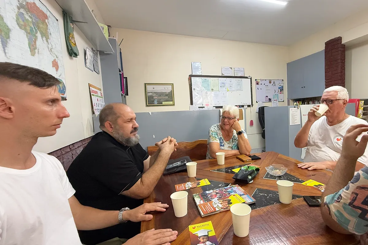 Working through paperwork together at the table